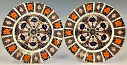 A pair of Royal Crown Derby 1128 pattern dinner plates, 27cm diameter, second quality