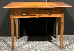 An Arts & Crafts period oak side table, oversailing rectangular top with moulded edge above a pair