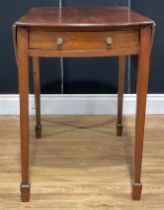 A 19th century mahogany oval Pembroke table