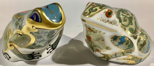A Royal Crown Derby paperweight, Marsh Frog, gold stopper; another, Fountain Frog, gold stopper (2)