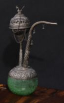 An Indian silver coloured metal hookah, pierced and chased with leafy scrolls and lotus, the cover