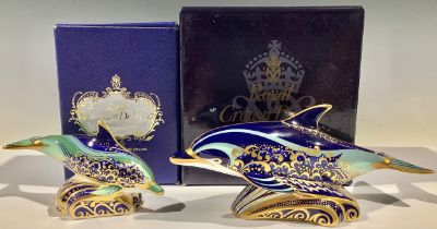 A Royal Crown Derby paperweight, Bottlenose Dolphin, gold stopper, boxed; another, Baby Bottlenose