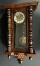 An early 20th century Vienna wall clock, 74cm high