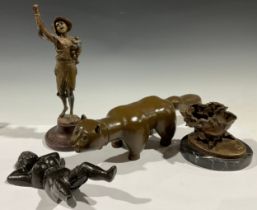 A bronze animal; a figure of a boy; a bronze floral root vase; a cast iron boot pull, as a lady