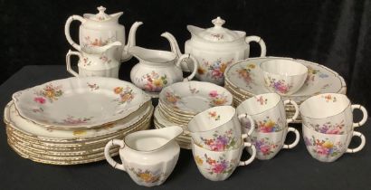 A Royal Crown Derby Posies dinner and tea service for six comprising dinner plates, dessert bowls,