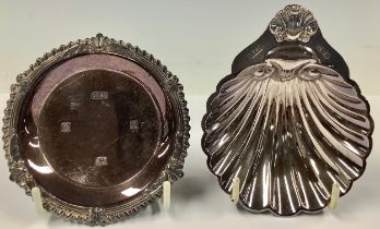 A silver shell shaped dish, Birmingham 1973; a silver shaped circular trinket dish, Birmingham 1974;
