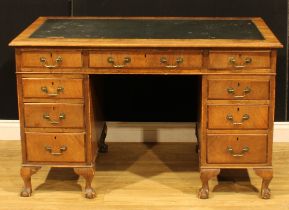 A George III style mahogany desk, 76.5cm high, 123cm wide, 66cm deep