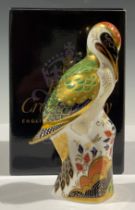 A Royal Crown Derby paperweight, Green Woodpecker, gold stopper, boxed