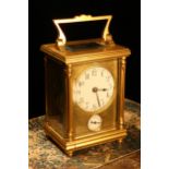 A late 19th century French gilt brass carriage alarm timepiece, 5cm enamel clock dial inscribed with