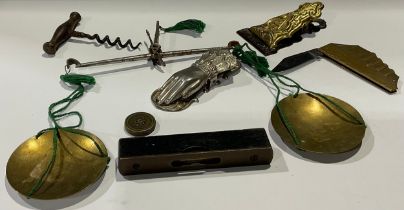 A set of 19th century hand balance scales; late 19th century document clips; a penknife, modelled as