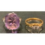 A 9ct gold pink stone dress ring, stamped 9ct, another interlocking hearts, unmarked, 6.7g gross