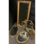 Mirrors - an early 20th century gilt-framed wall mirror, bevelled plate, 115cm x 57cm; a Victorian