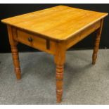 A Victorian pitch pine table, single cutlery drawer to short end, turned legs, c.1890, 76cm high x