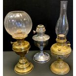 An American Miller Lamp Company brass oil lamp, ornate embossed body, others brass; chromed (3)