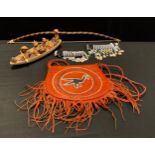 Tribal Art - a Native American leather handbag; two African beaded knife sheaths; a pygmy bow;