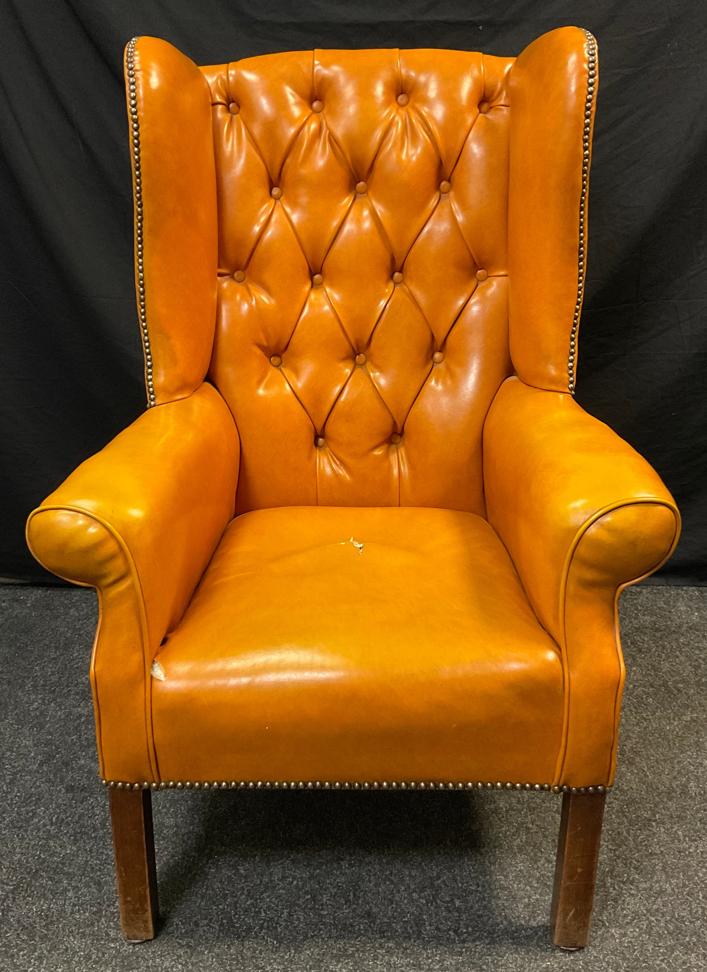 A Chesterfield wing-back office armchair, button back, warm ochre leather, square legs, 110cm high x - Image 2 of 2