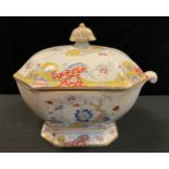 A 19th century Masons Ironstone soup tureen and cover, decorated in a Tree and floral pattern