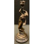 A contemporary bronze figural candle stick, signed Milo, marble plinth, 33.5cm, high.