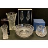 A Stuart crystal glass bowl; vase; pair of Royal Doulton crystal Many Happy Returns toasting flutes;