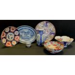 Oriental ceramics - An 18th century Chinese oval blue and white dish decorated with pagodas with