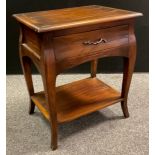 A contemporary walnut hall table, over-sailing top, single drawer to frieze, serpentine legs, single