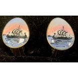 A pair of Norwegian Holth enamelled sterling silver clip on earrings, each with longship panels,