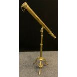 A reproduction brass refracting telescope, 1.5” objective, length of main tube 57cm, adjustable