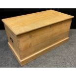 An early 20th century carpenter’s pine tool chest, 47cm high x 91.5cm wide x 50cm.