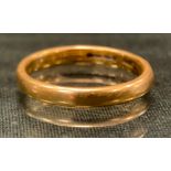 A 22ct gold wedding band, size P, 4.9g