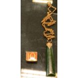 A 9ct gold mounted jade table pendant necklace, 5.1g; 9ct gold 10 shilling note charm, 2.3 g gross