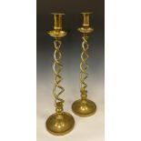 A pair of Victorian brass double-helix twist candlesticks, dished circular bases, 48cm high, (2).
