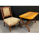 An Edwardian inlaid walnut salon / nursing chair; a reproduction mahogany occasional table, (2).