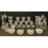 Glassware - A set of six cut glass sundae dishes, a a pair of table oil lamps, four aqua blue fluted