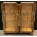 A Chinoiserie china display cabinet, walnut veneer with lacquered decoration depicting figures and