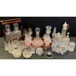 Glass - Secured decanter holder , cut glass ship decanter with four conforming brandy glasses and