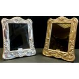 A pair of silver Art Nouveau style photo frames, London 2021,12.5cm x 9cm (excluding frame)(2)