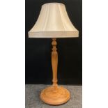 A large walnut table lamp, turned and reeded column, circular base, 97cm high x 35cm diameter (at