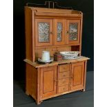 A miniature pine dresser kitchen cabinet, shaped gallery, three glassed doors, open shelf above base