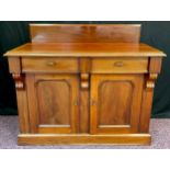A late Victorian mahogany sideboard, quarter galleried back, pair of short drawers to frieze,