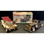 A battery operated Veteran mystery action car; others (3)