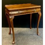 A mid 20th century walnut side table by Pratts of Bradford, serpentine front, single frieze draw,