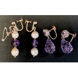 A pair of 9ct gold mounted diamond and amethyst drop earrings; another pair amethyst and cultured