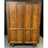 Mid century design - a Younger Furniture Afrormosia wood double wardrobe, designed by John