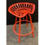 A retro ‘tractor-seat’ metal stool, painted red, rise-and-fall swivel seat, 68.5cm high.