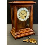 A walnut cased mantel clock, by the Hamburg Amerikanische Uhrenfabrik (HAC) company, 8-day fusee