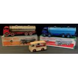 Dinky Toys - a 504 Foden 14 ton Tanker, red cab, grey tanker, red hubs, grey tyres; another two tone