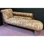 A late Victorian mahogany Chaise lounge, 84cm high x 186.5cm long x 65cm deep, and a conforming pair