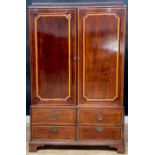 A Sheraton Revival satinwood banded mahogany hanging press cupboard, formerly a linen press,