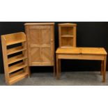 A Vintage oak child’s double school desk, 64cm high x 102cm wide x 40.5cm deep; pitch pine cupboard,