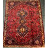 A South West Persian Qashgai rug / carpet, hand-knotted with triple medallion in a field of stylised